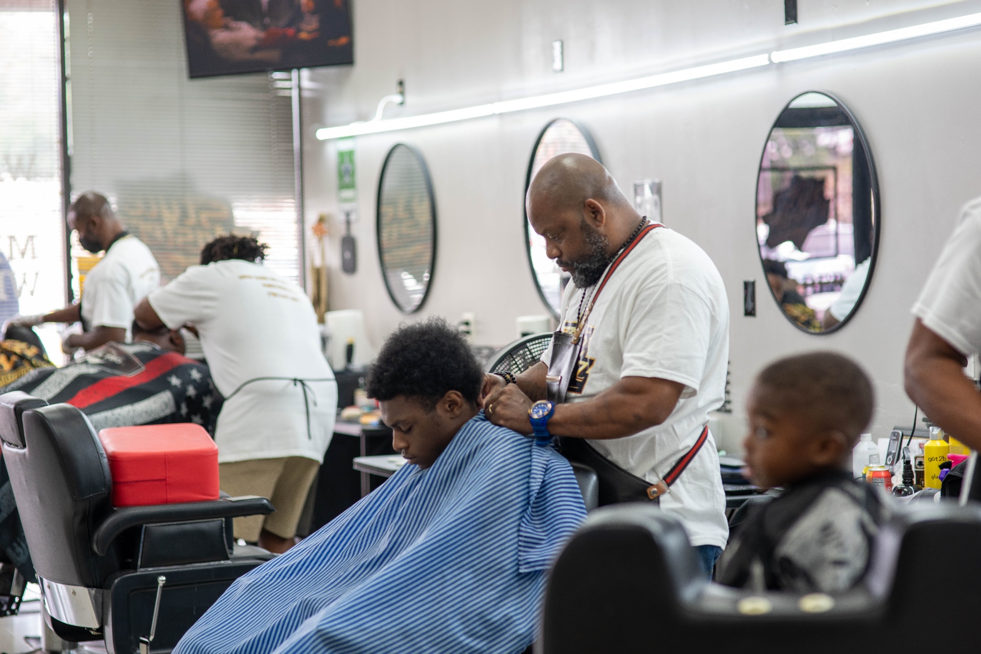 Style Masterz barbers working the floor in Fayetteville
