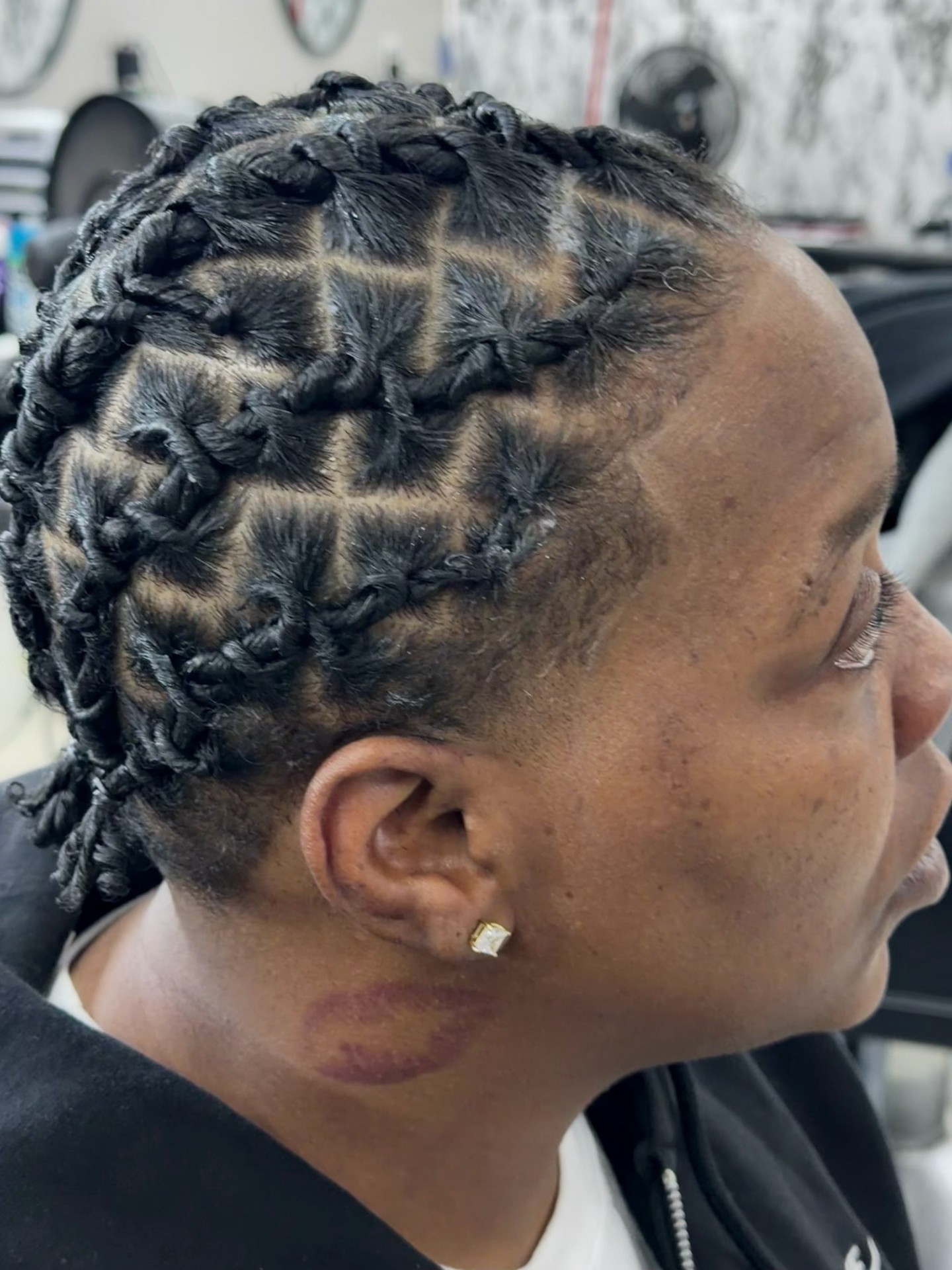 Distinctive box-braid pattern with tapered sides